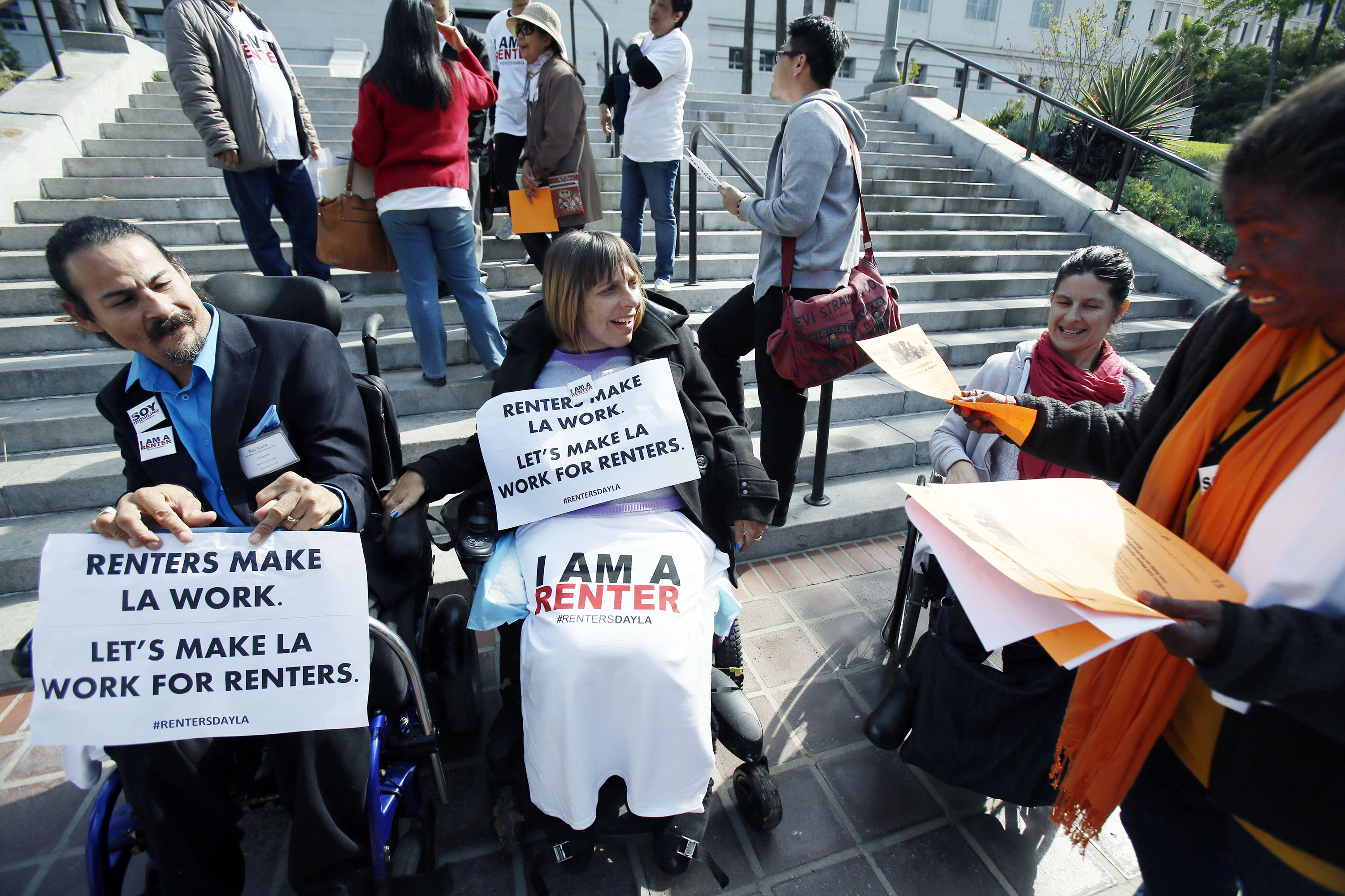 04/22/2015 - Los Angeles, Ca. - Outside City Hall,low-income renters and advocates hold a public rally to announcing their support for two motions on rent-stabilized housing set to be introduced by City Councilman Gil Cedillo (photo Ciro Cesar/La Opinion).