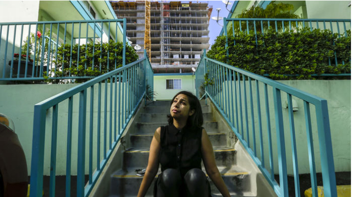 Sasha Ali, a resident of the Yucca-Argyle Apartments, opposes a ballot initiative meant to spur the construction of more affordable housing. (Irfan Khan/Los Angeles Times)