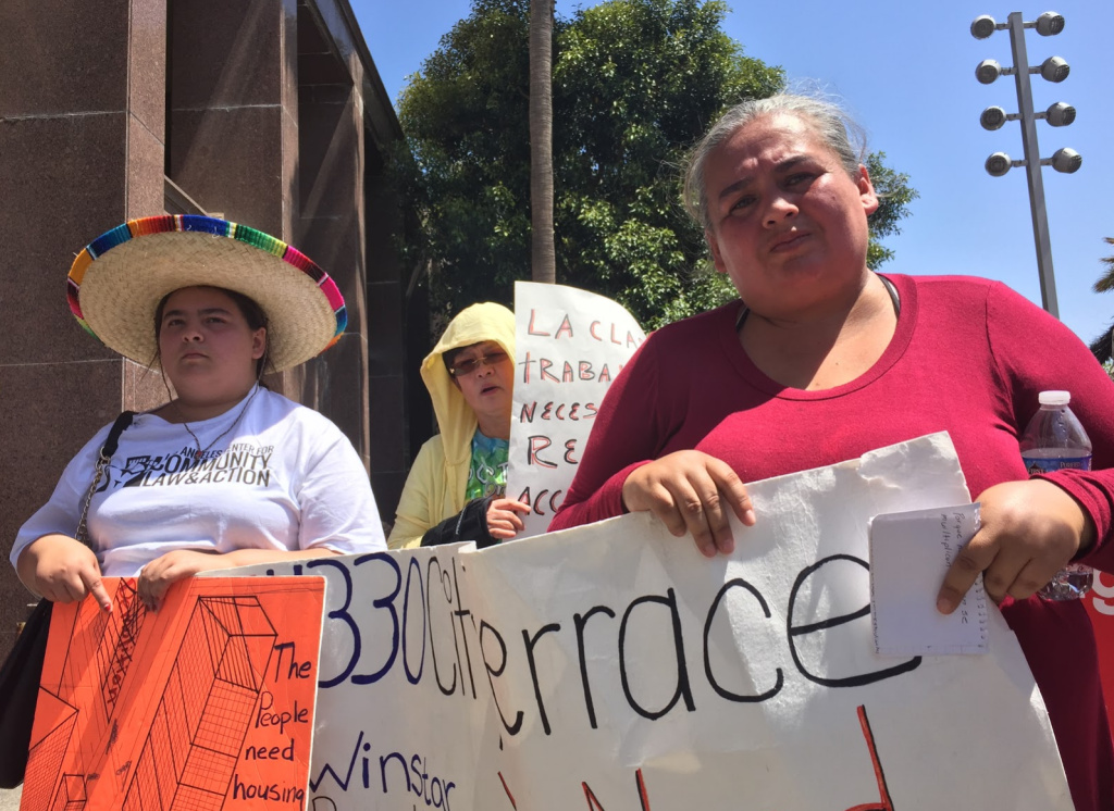 Carolina Rodriguez joined other tenants in calling for more tenant protections in unincorporated areas of Los Angeles County like East L.A., where she lives. JOSIE HUANG/KPCC