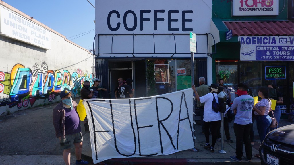 Anti-gentrification activists staged a protest outside Weird Wave Coffee Brewers recently, chanting "Weird Cafe has got to go."