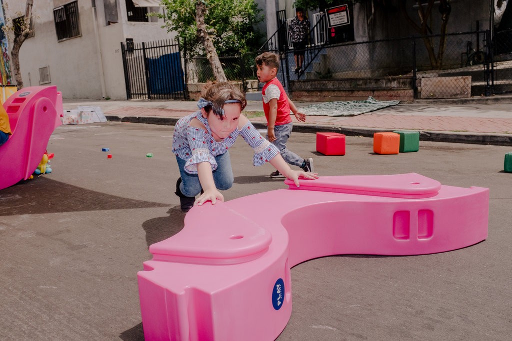 Plastic â€œwobblesâ€ provided by KDI became building blocks, seesaws and more.CreditColey Brown for The New York Times