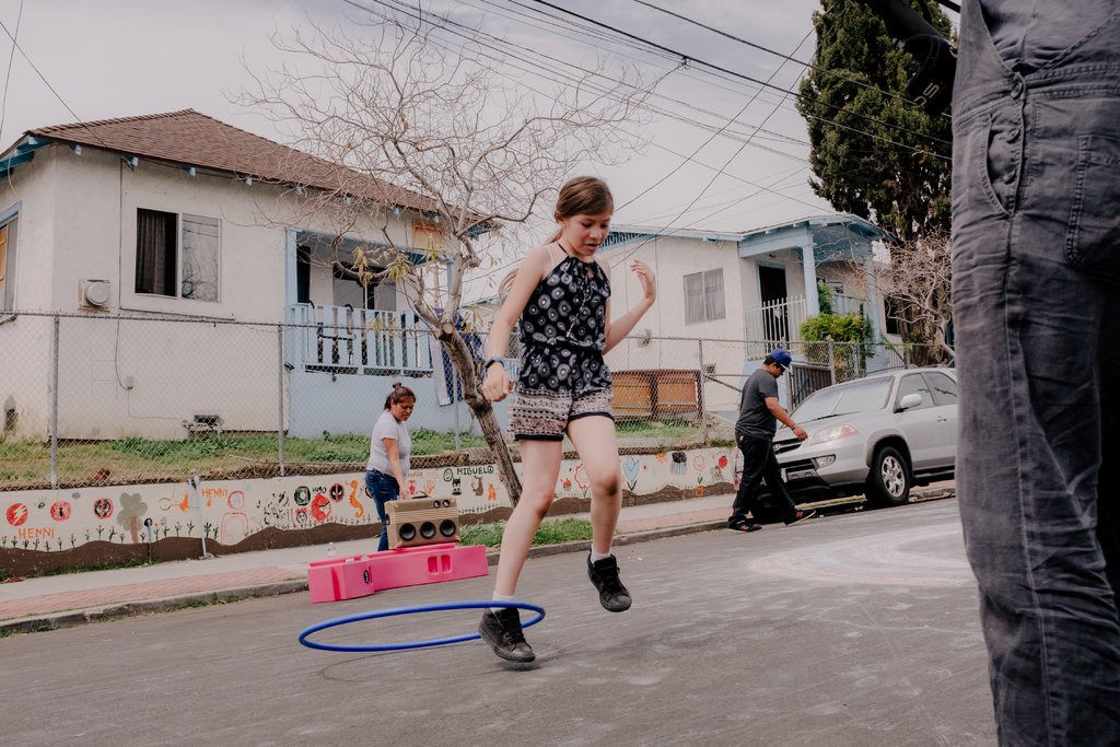 Fickett Street in Boyle Heights, a neighborhood in Los Angeles transformed into a one-day “play street” as part of a design initiative to reclaim streets for civic life. It was a collaboration with residents, activists, the nonprofit Kounkuey Design Initiative and the Los Angeles Department of Transportation.CreditColey Brown for The New York Times