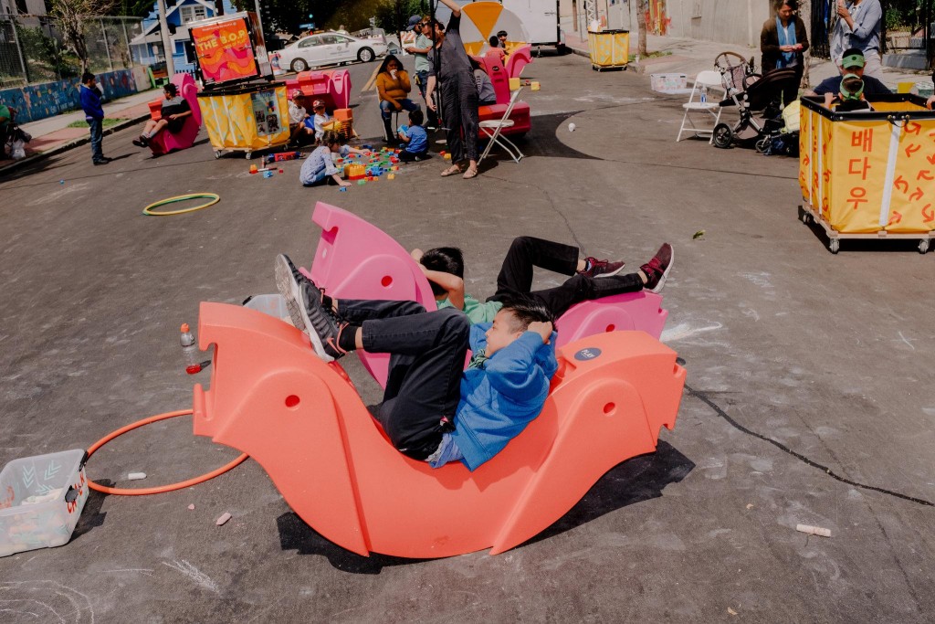 Children on Fickett Street in Boyle Heights turn wobbles into lounge chairs.Credit: Coley Brown for The New York Times